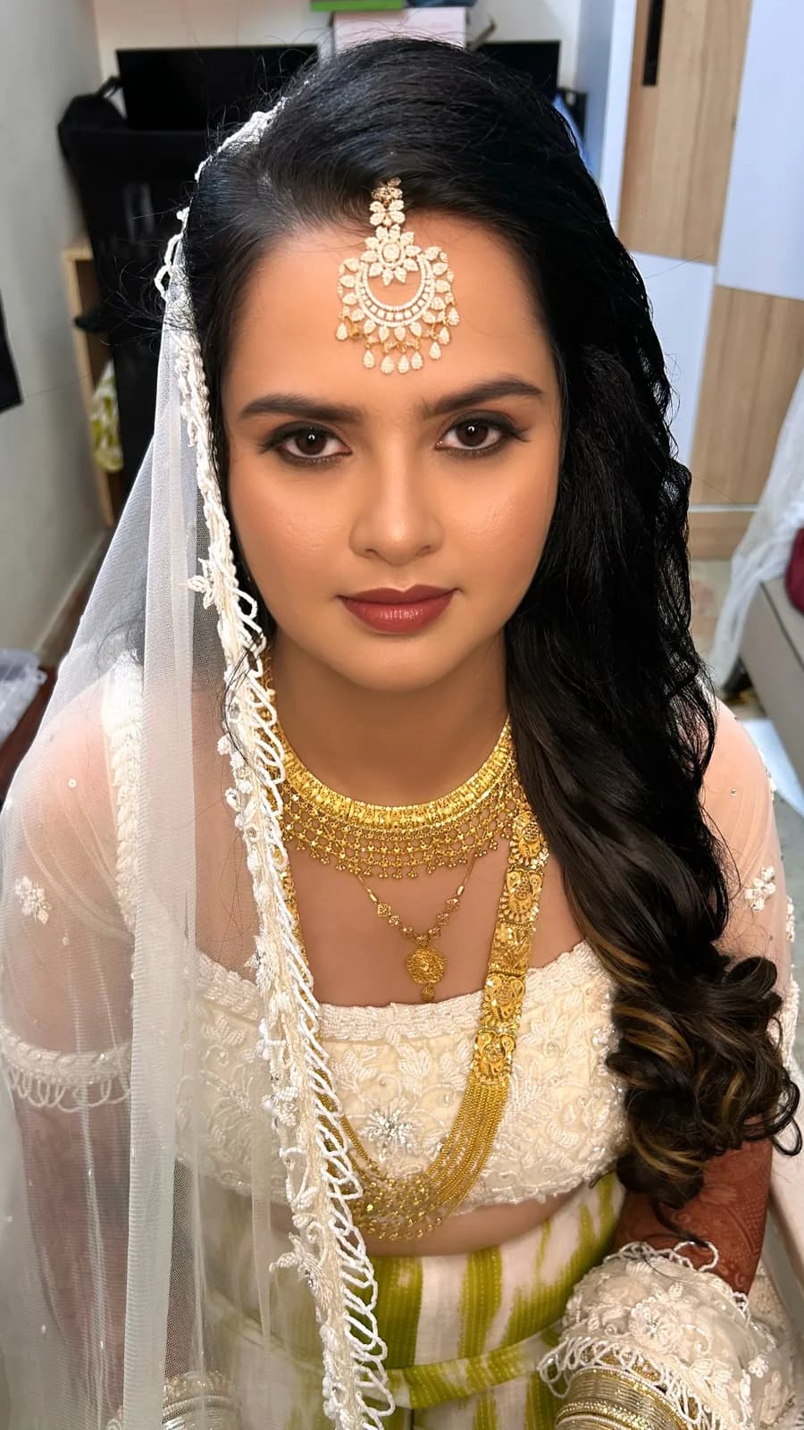 Bridal makeup session in progress